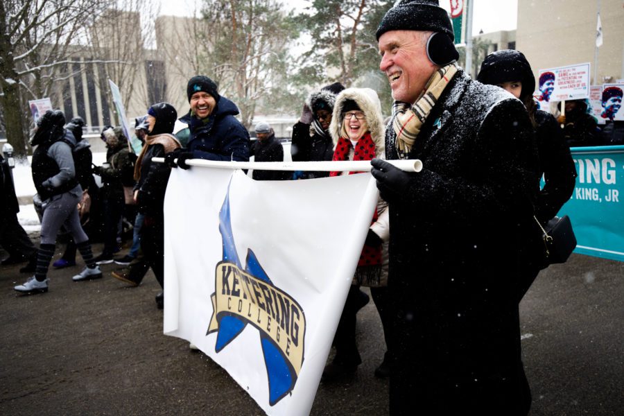 Kettering College academic deans, Josefer Montes and Ruth Abbott, were joined by Victor Brown, Dean of Enrollment and Student Life as they participated in the Martin Luther King Jr march on January 15, 2018 in downtown Dayton. 